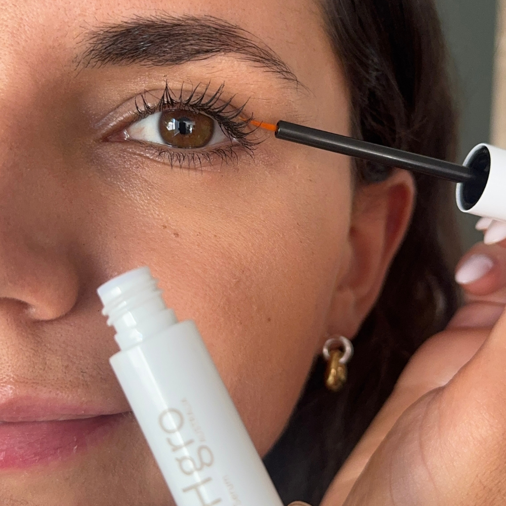 Jess applying lash serum